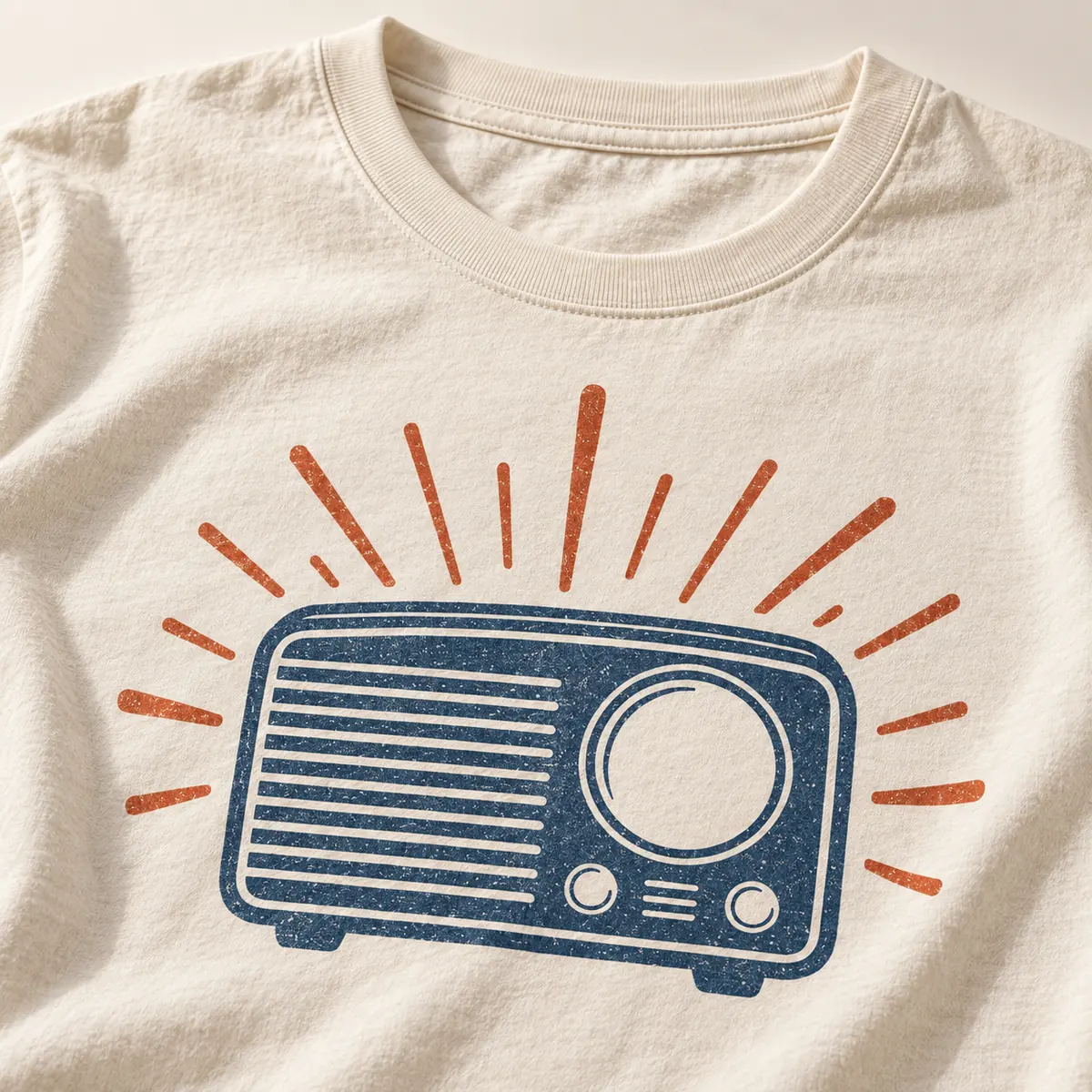 Detail mockup of a cream crew neck T-shirt in the Desert Radio design